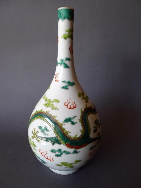 A Daoguang Mark and Period Dragon vase
