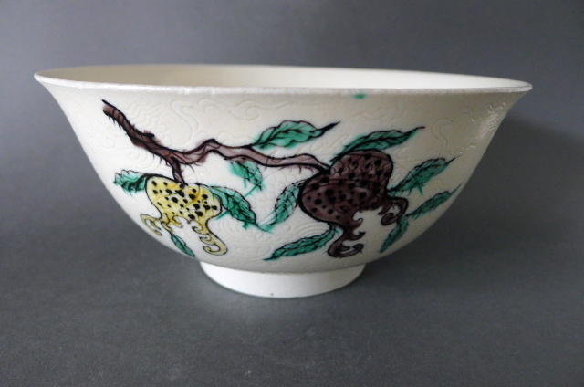 A Kangxi  famille verte biscuit-enameled incised bowl