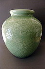 A beautiful, large, moulded Celadon glazed Dragon Jar