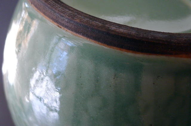 A beautiful, large, moulded Celadon glazed Dragon Jar