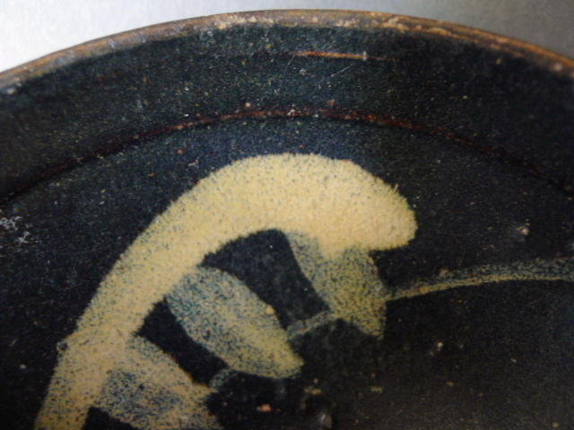 A Song black glazed Jizhou tea bowl with Prunus pattern