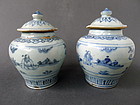 A rare pair of early Ming blue and white jars with lid