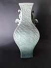 A very beautiful, moulded, bluegreen Celadon vase