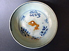 A Ming Hongwu blue and white dish with biscuit fish