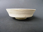 A rare, white glazed Song - Yuan "shufu" shape bowl