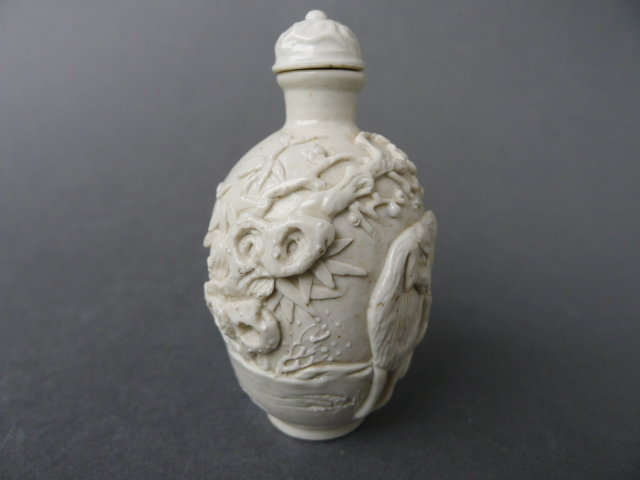 A finely carved porcelain bottle Wang Bingrong
