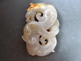 A finely carved White and Russet Jade, Qianlong Period