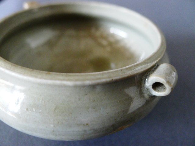 An excellent Yue ware small jar with a very decorative, rare, shape