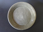A rare Five Dynasties Yue ware  dish with an incised Lotus decoration