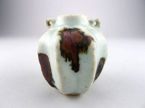 A superb Yuan octagonal "Belimbing-shape" jar with iron brown spots