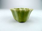 Qing Dynasty Celadon glazed cup in form of a crumpled lotus leaf