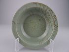 A very rare and important black-paste Guan-type Longquan dish