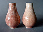 A pair of small Peachbloom glazed Vases