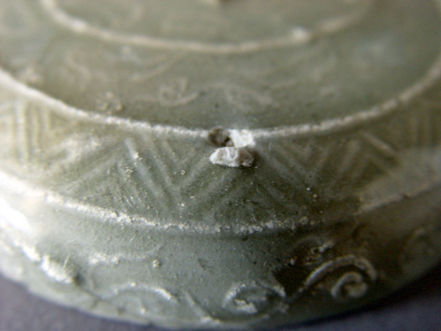 A rare Yue Ware covered box with a molded decoration
