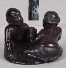 19c netsuke ONI & MONK arm wrestling on lotus by RAKUSHI