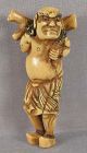 Early 19c netsuke SUIKODEN HERO with log