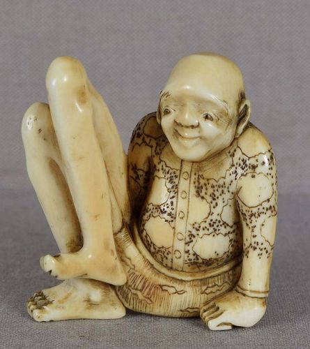 19c netsuke resting ASHINAGA European jacket