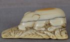 18c netsuke SLEEPING BOAR on leaves