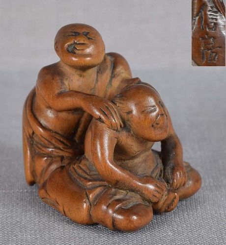 19c netsuke blind MASSEUSE & client by NOBUFUSA