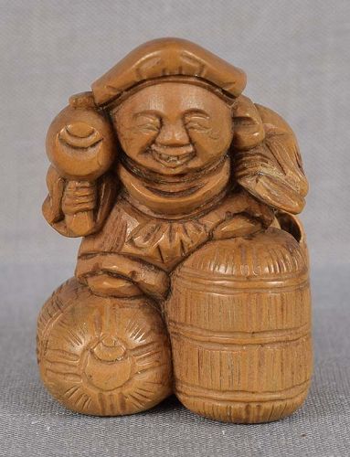 19c Japanese netsuke DAIKOKU on rice bales