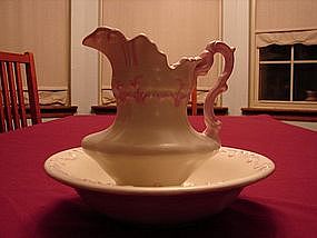 Nice Ceramic bowl and pitcher. Cream with pink trim.