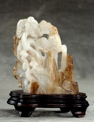 Chinese White Jade Boulder Depicting a Boy Playing on a Money Tree