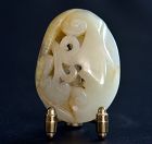 Jade Pendant Carved from a Nephrite Pebble Decorated with a Monkey