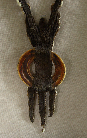 Kara’wut Boar's tusk, shell ornament Papua New Guinea