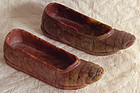 Antique small pair of carved stone shoes
