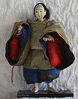 Edo period Japanese small standing retainer doll