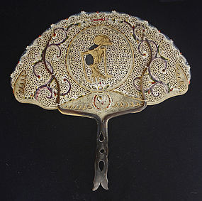Traditional Indonesian ornate fan of hide and horn