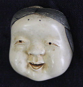 Meiji netsuke Noh theater mask of Okame