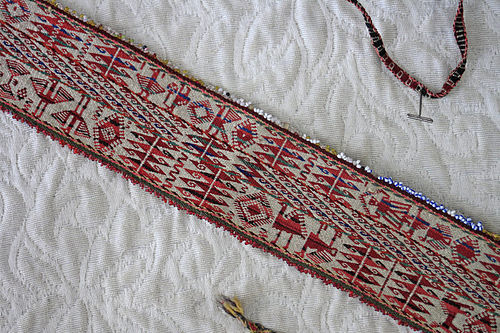 Antique Bolivian hand woven tie belt with beaded edges