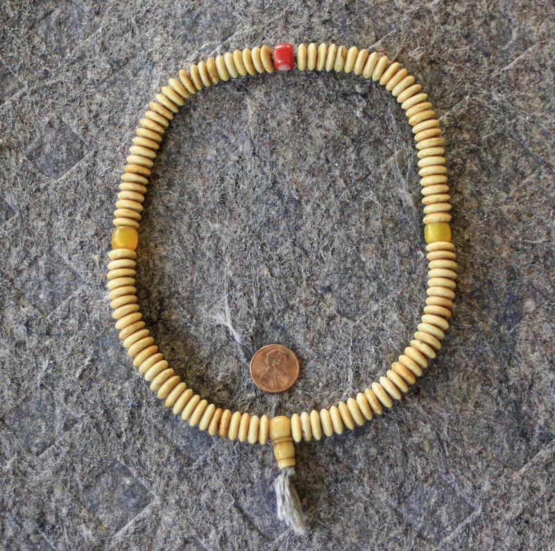 Antique Tibetan bone prayer beads with amber and coral