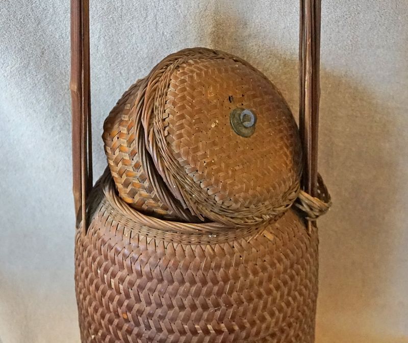 Antique Chinese tall narrow woven food storage basket