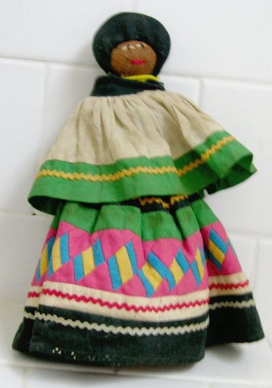 Seminole Indian Doll with traditional patch work skirt