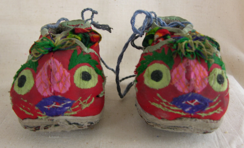 Chinese toddler's shoes with embroidered cat face