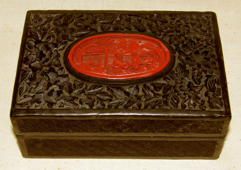 Antique Japanese carved cinnabar black lacquer box
