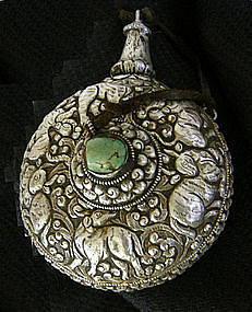 Tibetan silver repousse snuff bottle