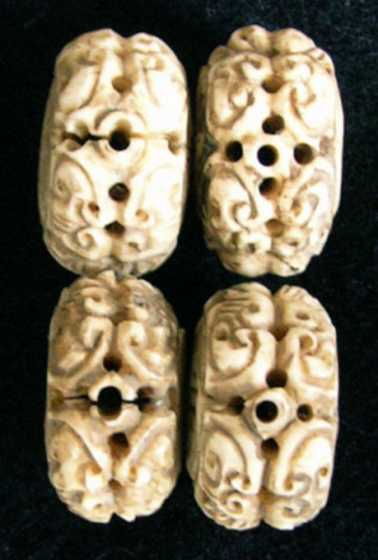 Antique Chinese hand carved bone toggles