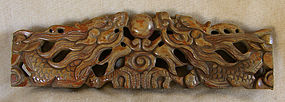 Antique Chinese wood carving of dragons and pearl