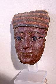 A FINE ANCIENT EGYPTIAN POLYCHROME WOOD MASK