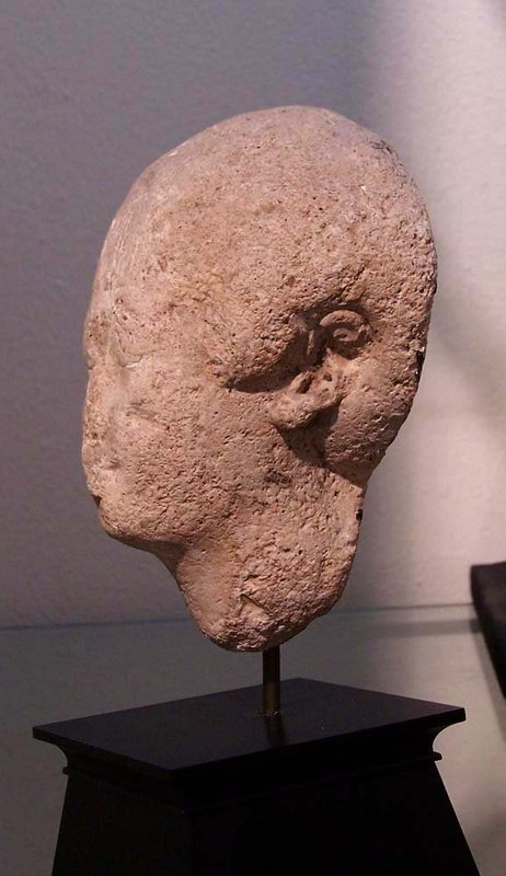 AN ANCIENT EGYPTIAN GYPSUM HEAD OF A MAN
