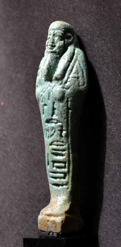 AN ANCIENT EGYPTIAN FAIENCE SHABTI