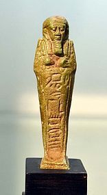 AN ANCIENT EGYPTIAN FAIENCE SHABTI