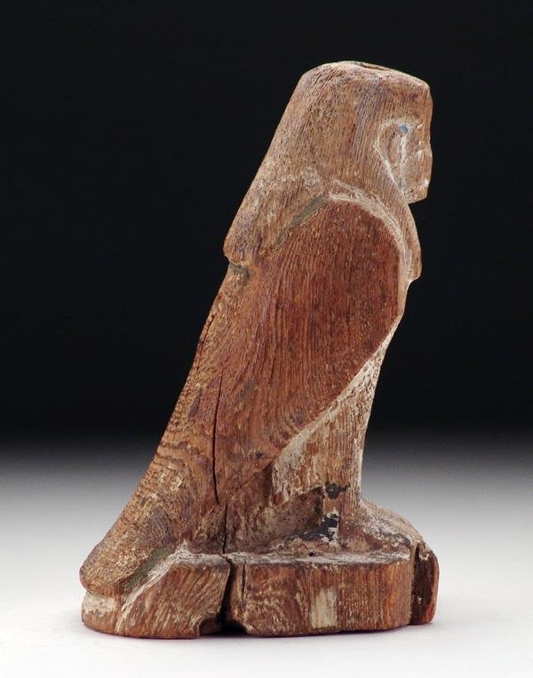 AN ANCIENT EGYPTIAN WOOD FIGURE OF A BA BIRD
