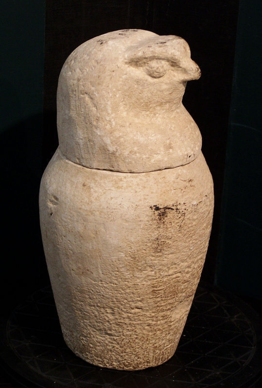 AN ANCIENT EGYPTIAN LIMESTONE CANOPIC JAR