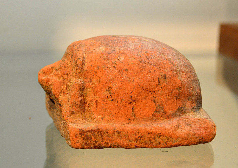 A LARGE ANCIENT EGYPTIAN TERRACOTTA SCARAB