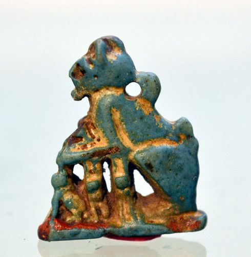 AN ANCIENT EGYPTIAN FAIENCE CAT AMULET