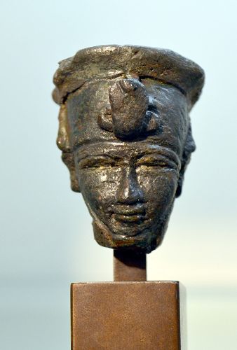 AN ANCIENT EGYPIAN BRONZE HEAD OF AMUN-RA